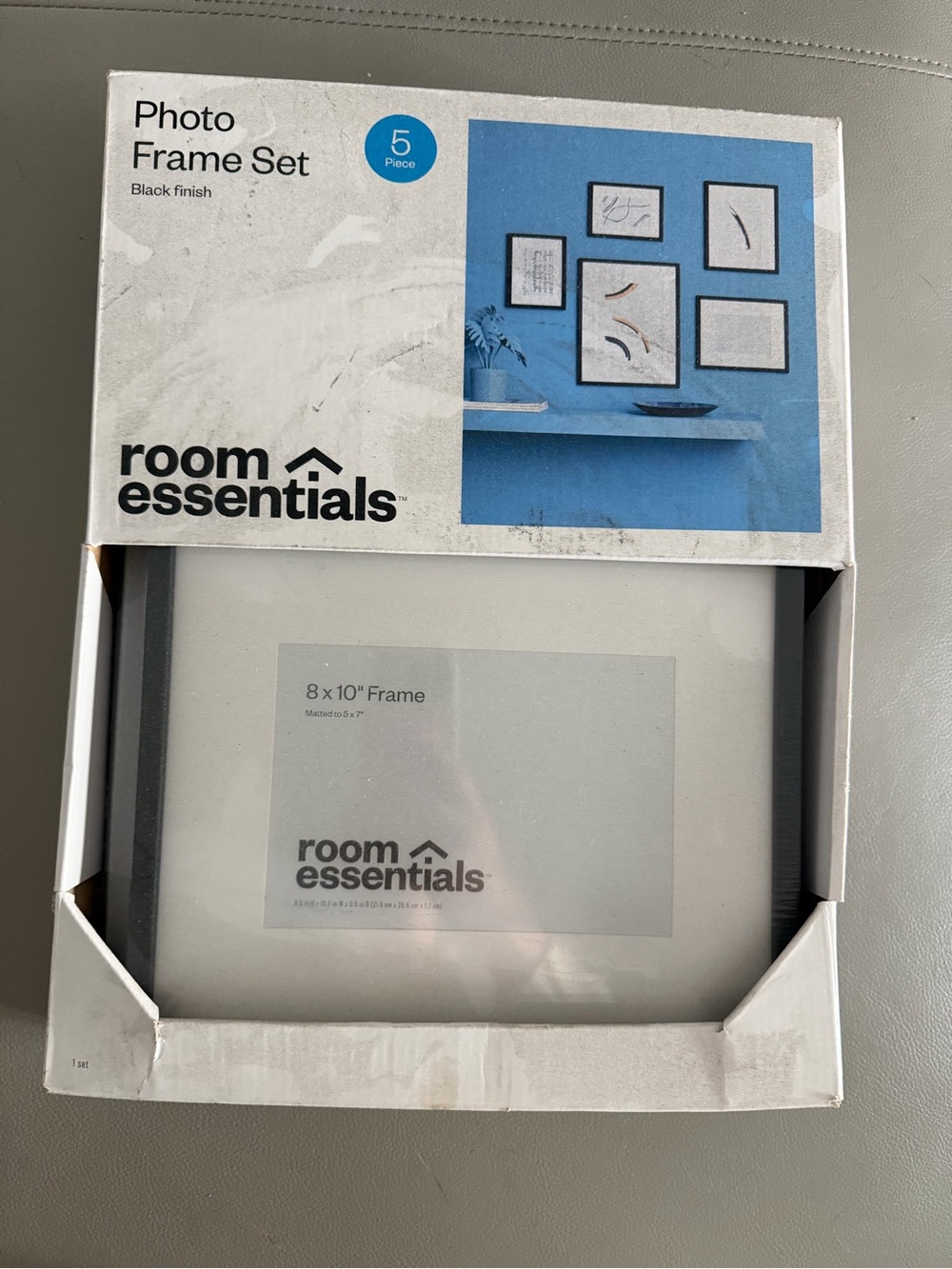 The Room Essentials 5-Piece Photo Frame Set in black finish.New sealed